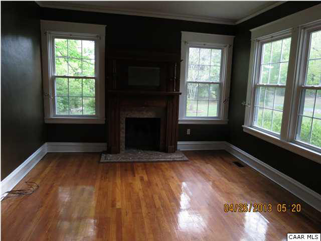 289 Bremo Bluff Road Bremo Bluff, VA 23022 - Photo 5 of 10 a view of an empty room with wooden floor and a window