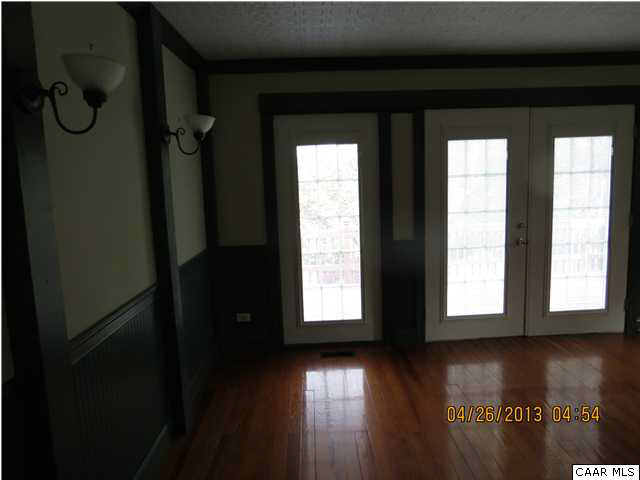 289 Bremo Bluff Road Bremo Bluff, VA 23022 - Photo 9 of 10 a view of empty room with wooden floor and fan