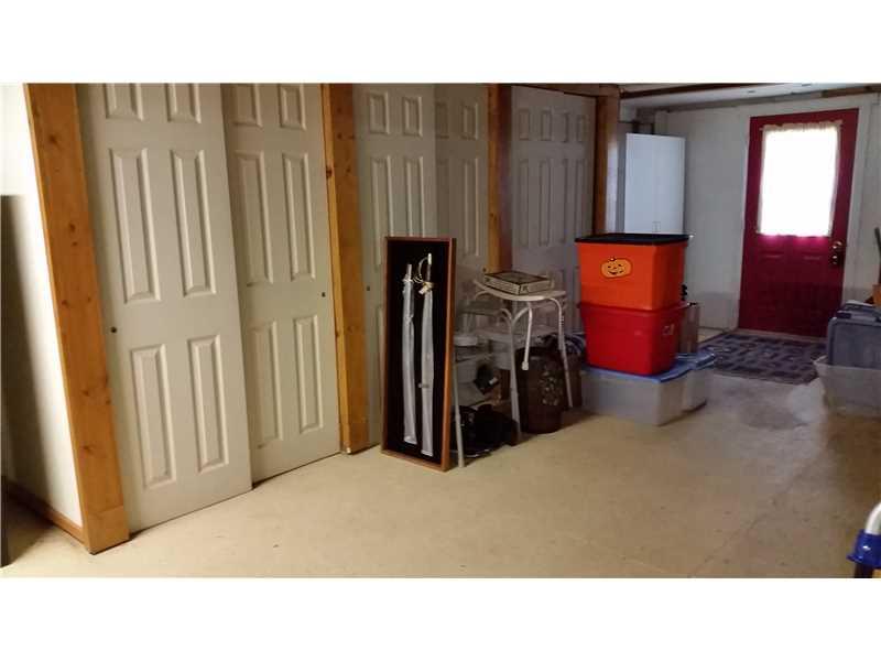369 Locust Hill Road Cheswick, PA 15024 - Photo 14 of 17 Basement/Game Room. Walk-out basement with laundry area and tons of dry storage.