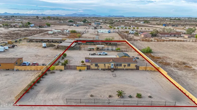 a view of swimming pool with an outdoor seating