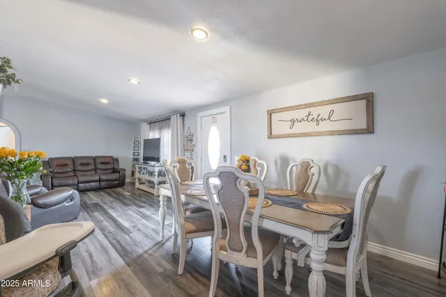 a view of a dining room with furniture