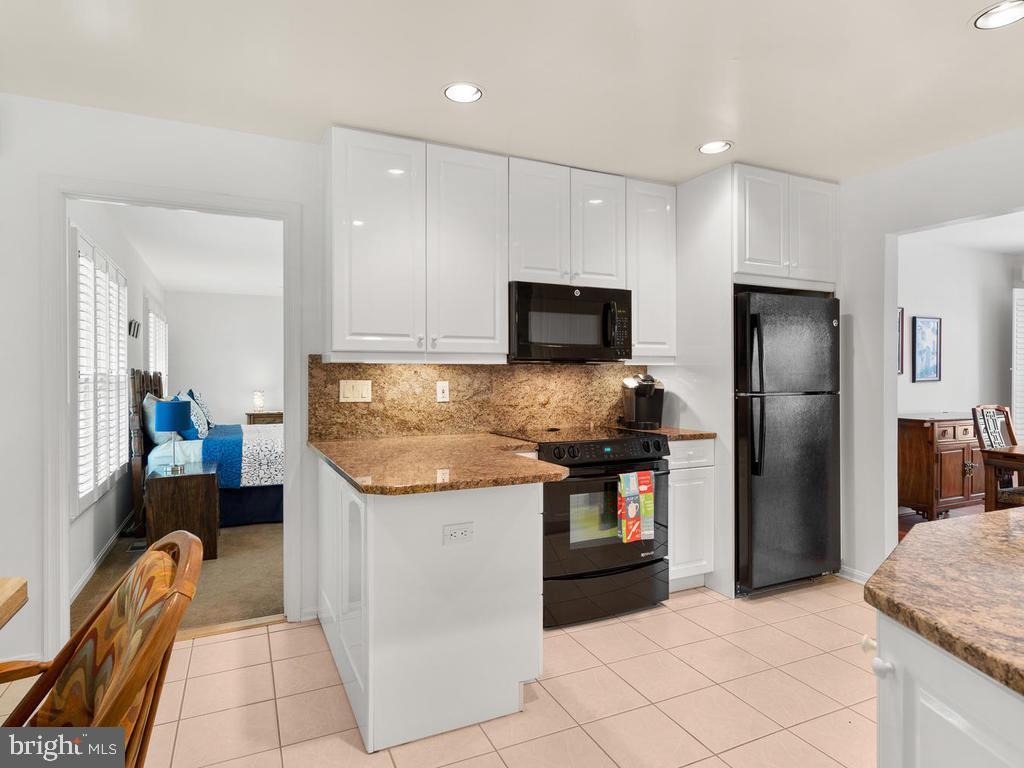 600 Bryants Nursery Road Silver Spring, MD 20905 - Photo 18 of 60 First floor master is right off kitchen