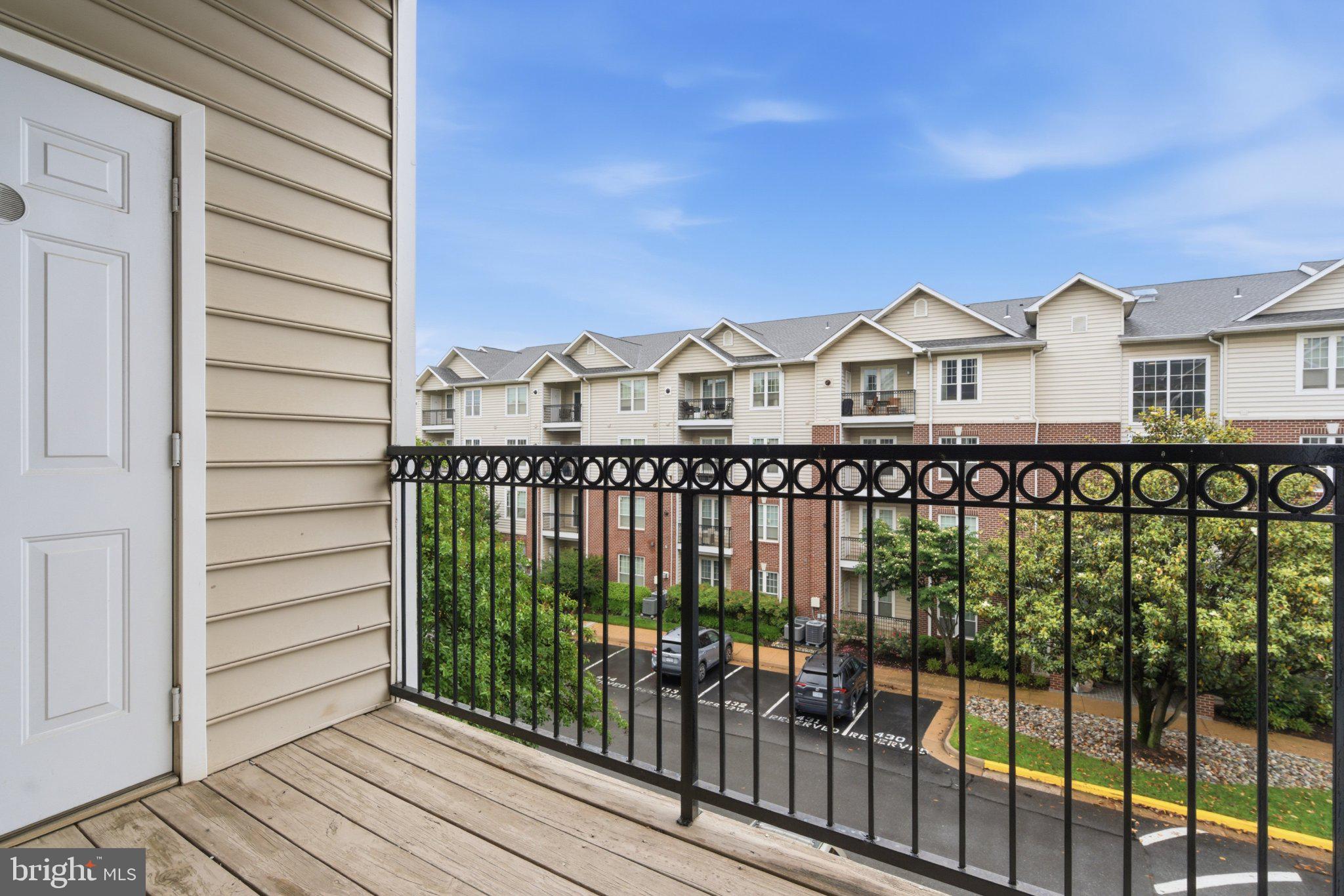1580 Spring Gate Dr., Unit 4303 McLean, VA 22102 - Photo 23 of 41 Charming balcony with serene views.