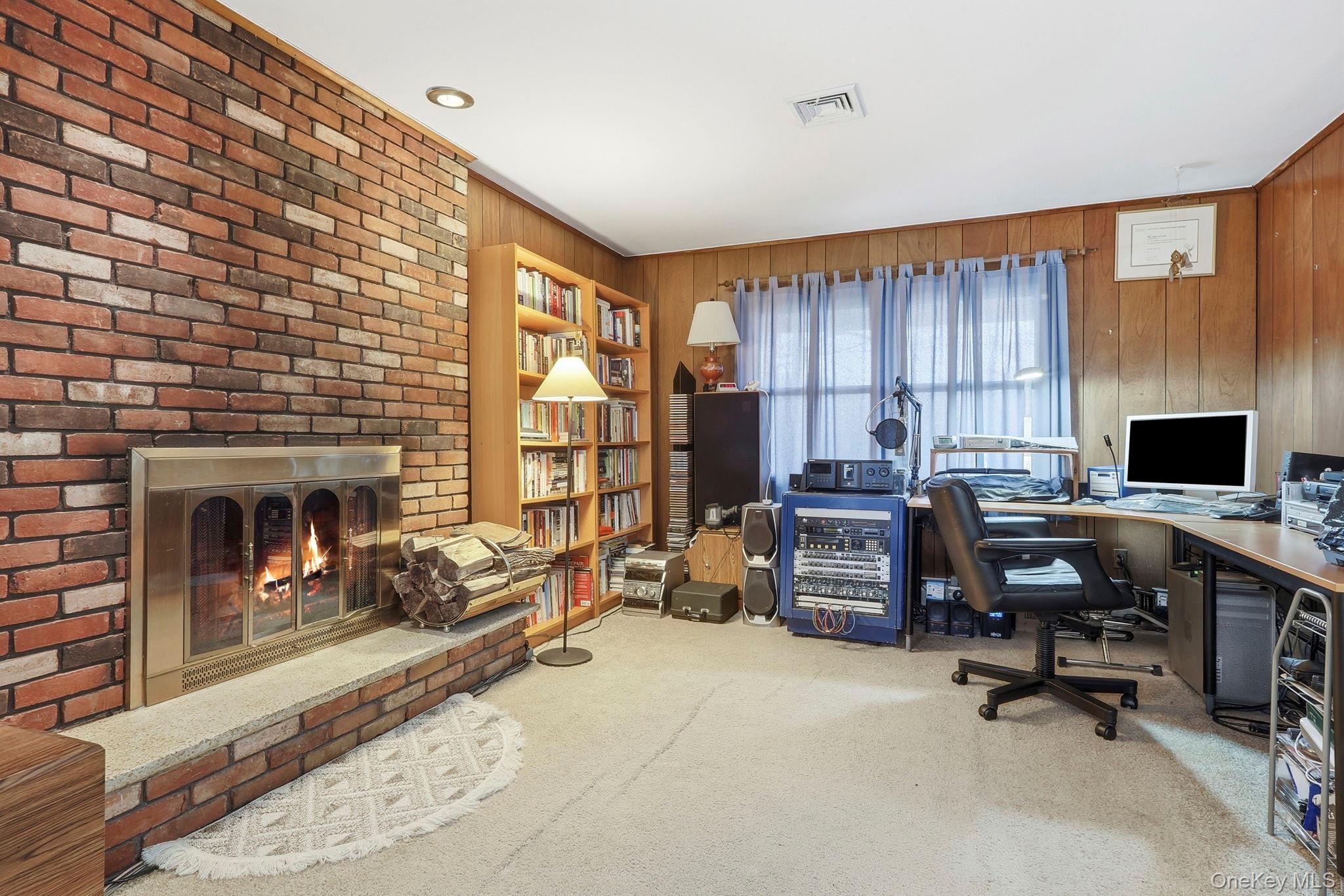 33 Fulmar Road Mahopac, NY 10541 - Photo 9 of 45 Family room with fireplace.