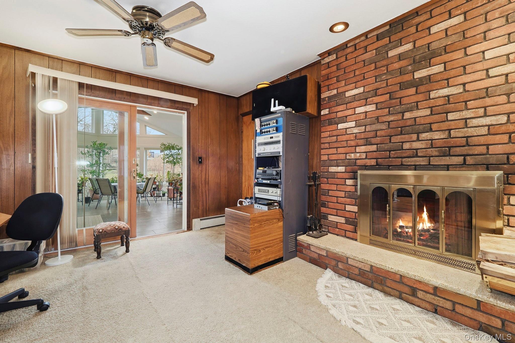 33 Fulmar Road Mahopac, NY 10541 - Photo 10 of 45 Family room with fireplace.