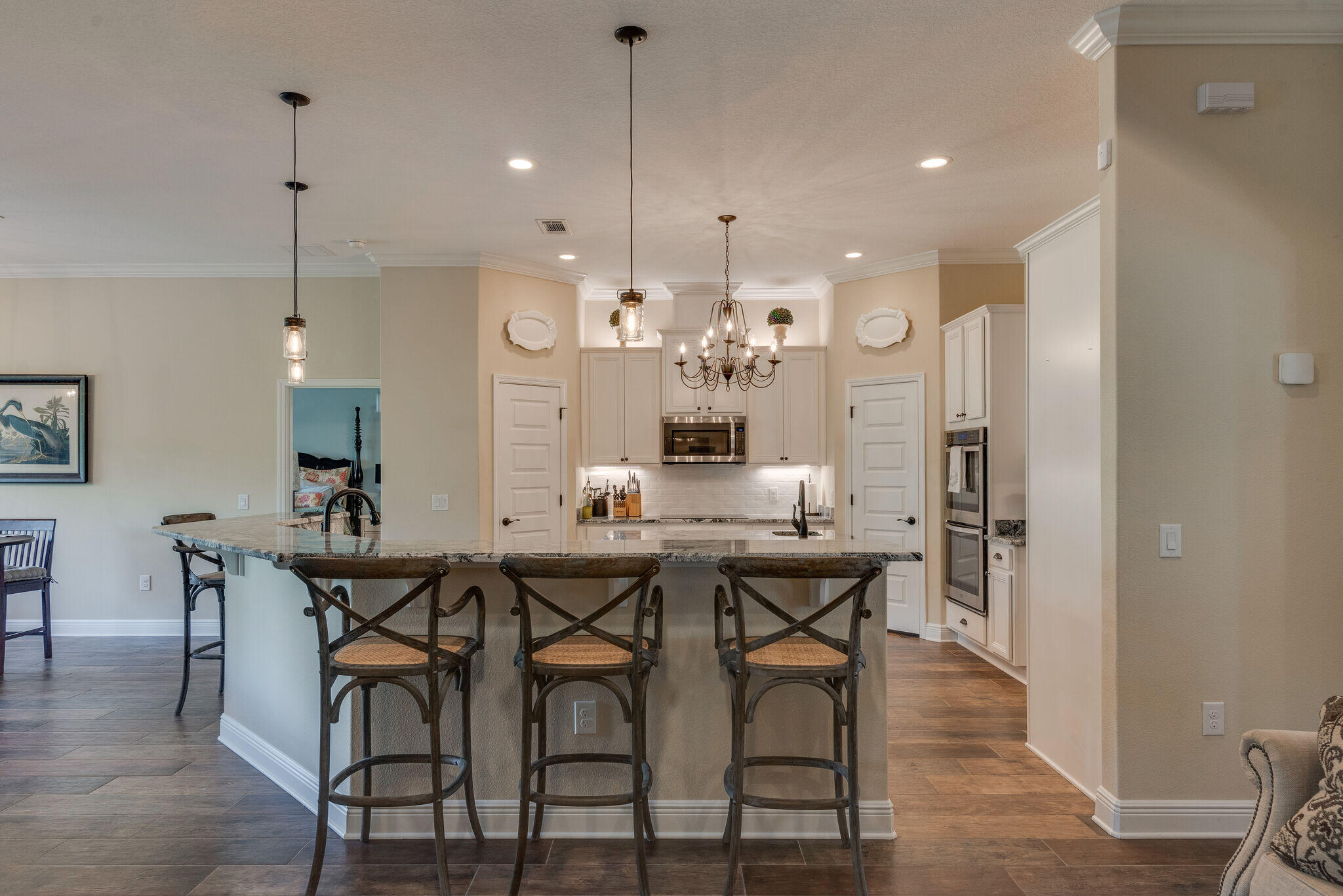 8640 Sand Pine Drive Navarre, FL 32566 - Photo 15 of 58 a view of a dining room with furniture