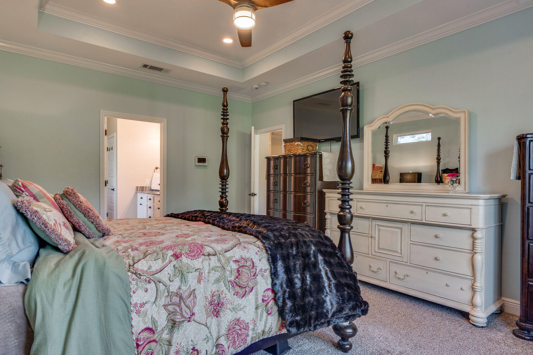 8640 Sand Pine Drive Navarre, FL 32566 - Photo 24 of 58 a bedroom with a bed and a dresser