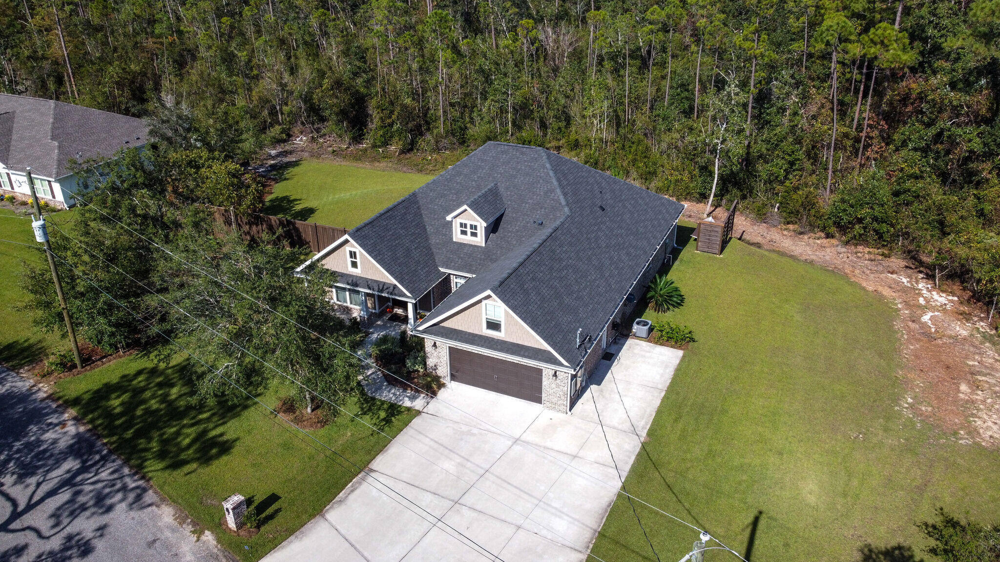 8640 Sand Pine Drive Navarre, FL 32566 - Photo 47 of 58 an aerial view of a house