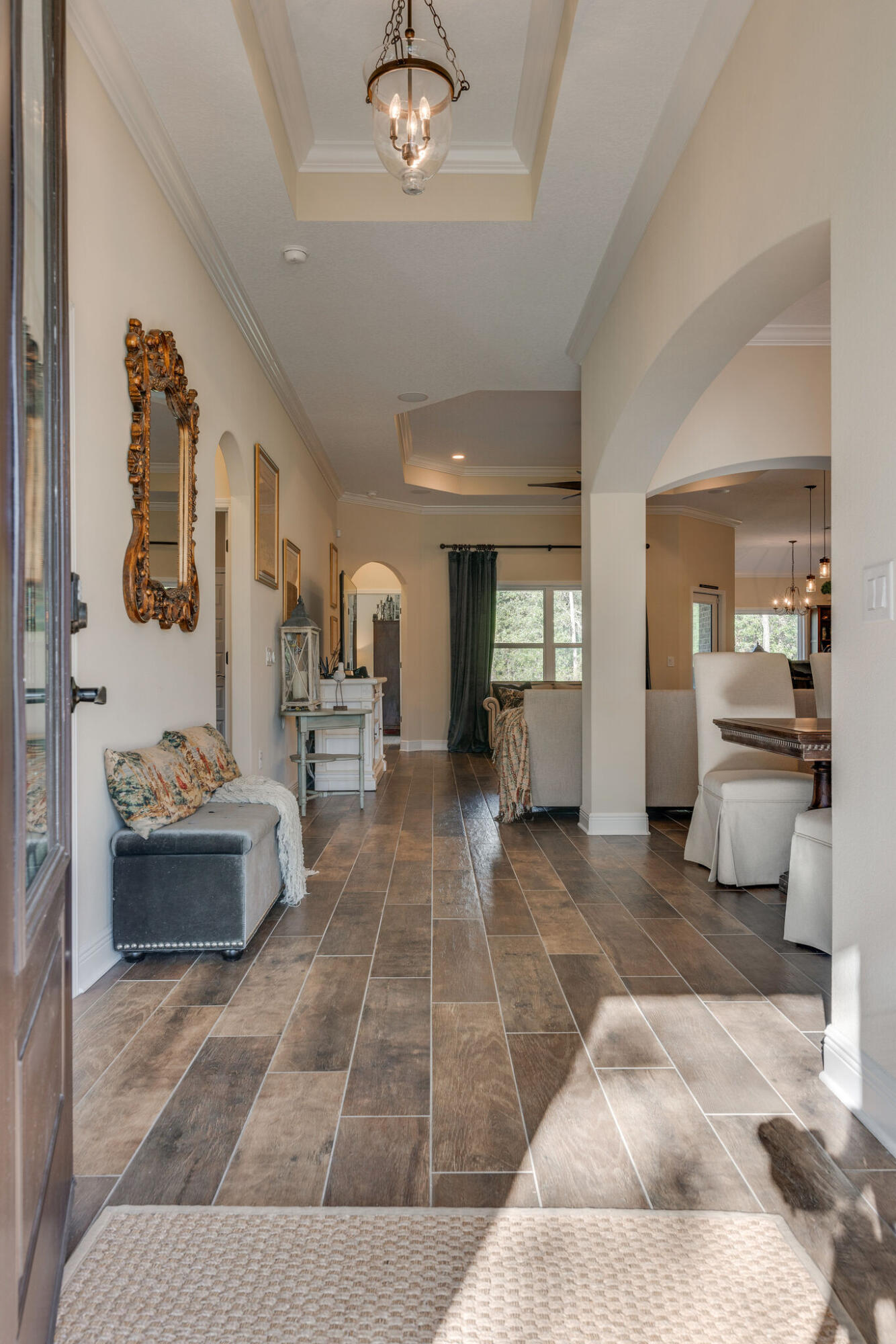 8640 Sand Pine Drive Navarre, FL 32566 - Photo 7 of 58 a living room with furniture and view of kitchen