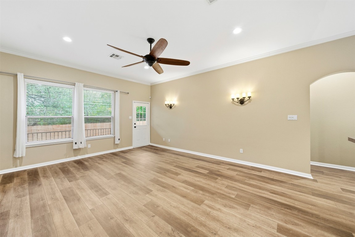 2989 Peacemaker Street Round Rock, TX 78681 - Photo 16 of 40 a view of room window and wooden floor