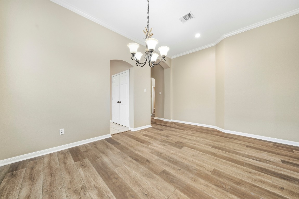 2989 Peacemaker Street Round Rock, TX 78681 - Photo 20 of 40 a view of a chandelier in a room