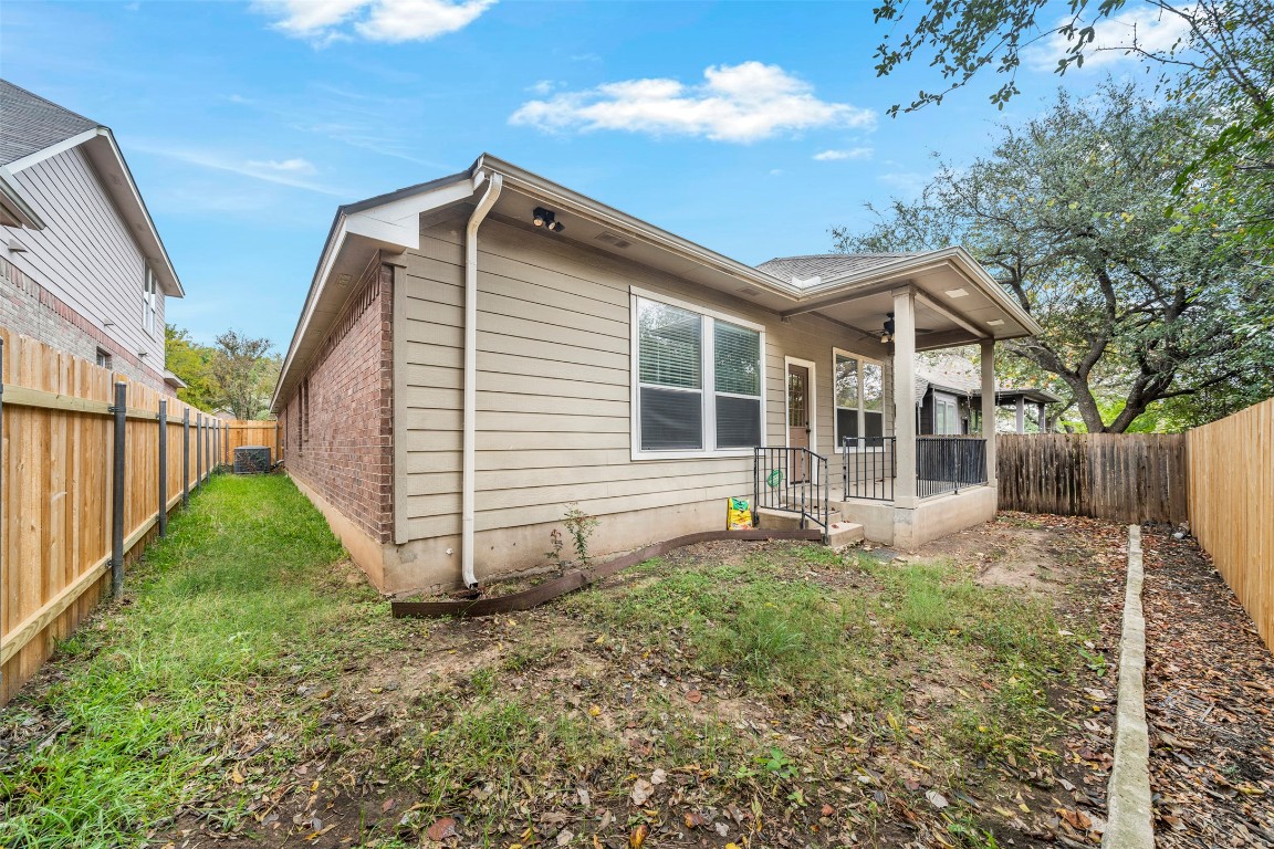 2989 Peacemaker Street Round Rock, TX 78681 - Photo 40 of 40 a view of a house with backyard and garden
