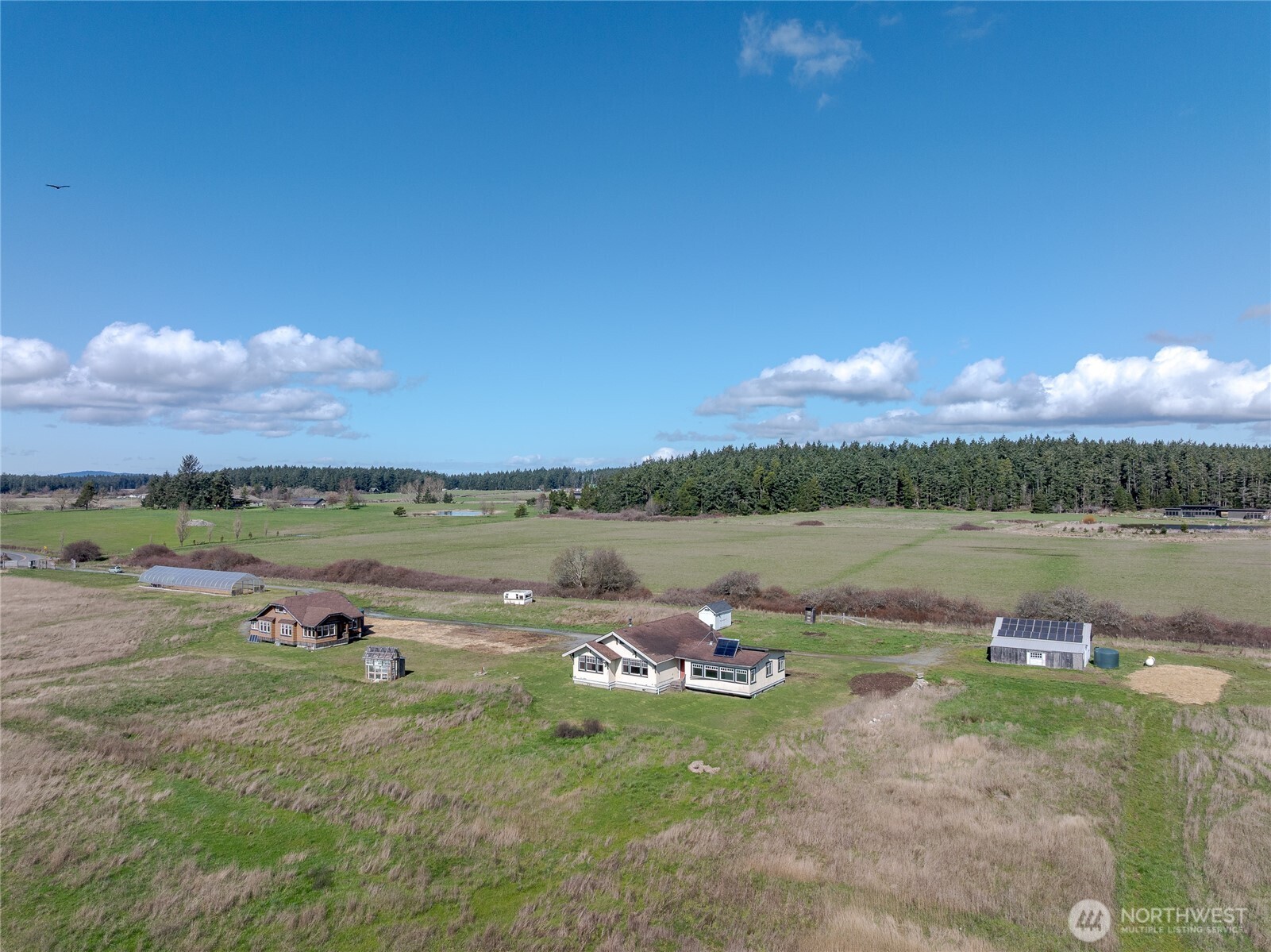 5625 Fisherman Bay Road Lopez Island, WA 98261 - Photo 11 of 40 a view of a lake in middle of the town