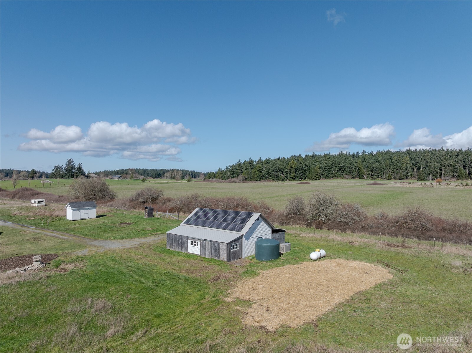 5625 Fisherman Bay Road Lopez Island, WA 98261 - Photo 12 of 40 a view of a lake with a big yard