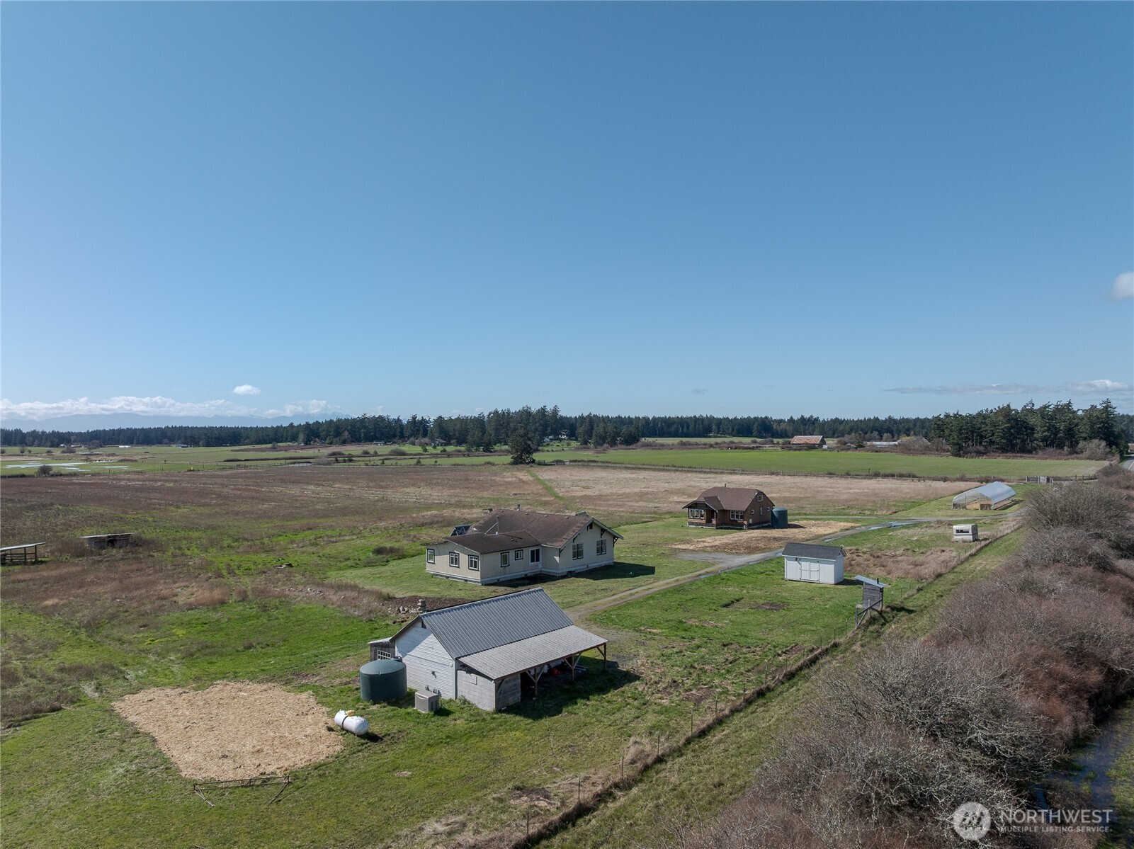 5625 Fisherman Bay Road Lopez Island, WA 98261 - Photo 13 of 40 a view of a lake with a city view