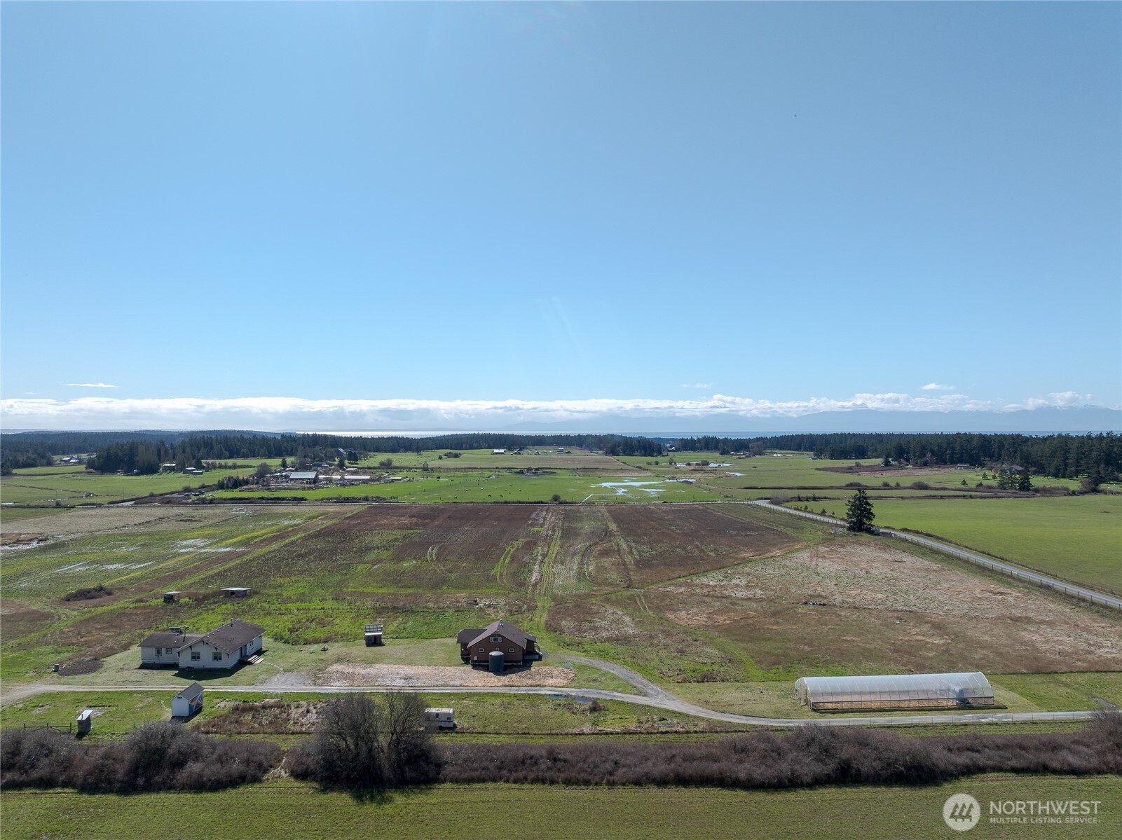 5625 Fisherman Bay Road Lopez Island, WA 98261 - Photo 14 of 40 a view of a water with an outdoor space