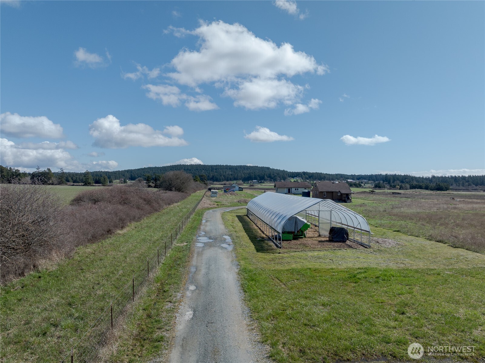 5625 Fisherman Bay Road Lopez Island, WA 98261 - Photo 15 of 40 a view of a lake in front of house