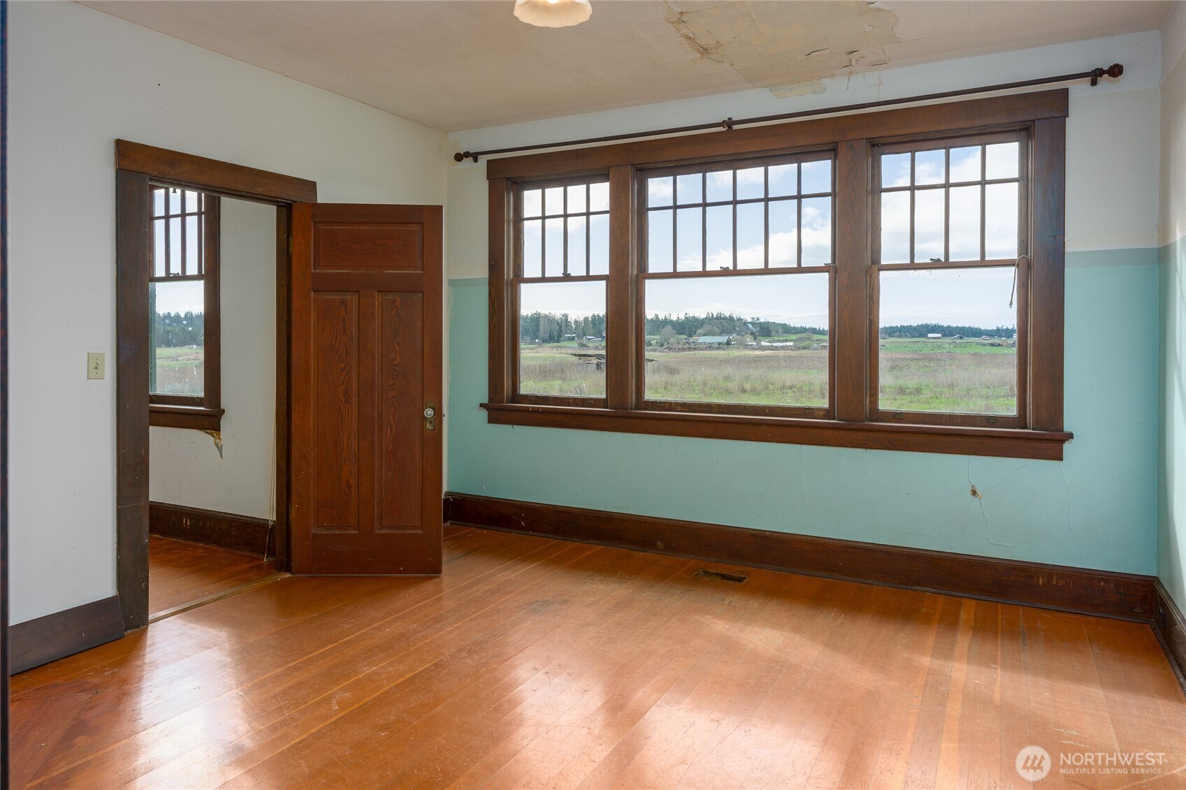 5625 Fisherman Bay Road Lopez Island, WA 98261 - Photo 25 of 40 an empty room with window and closet area