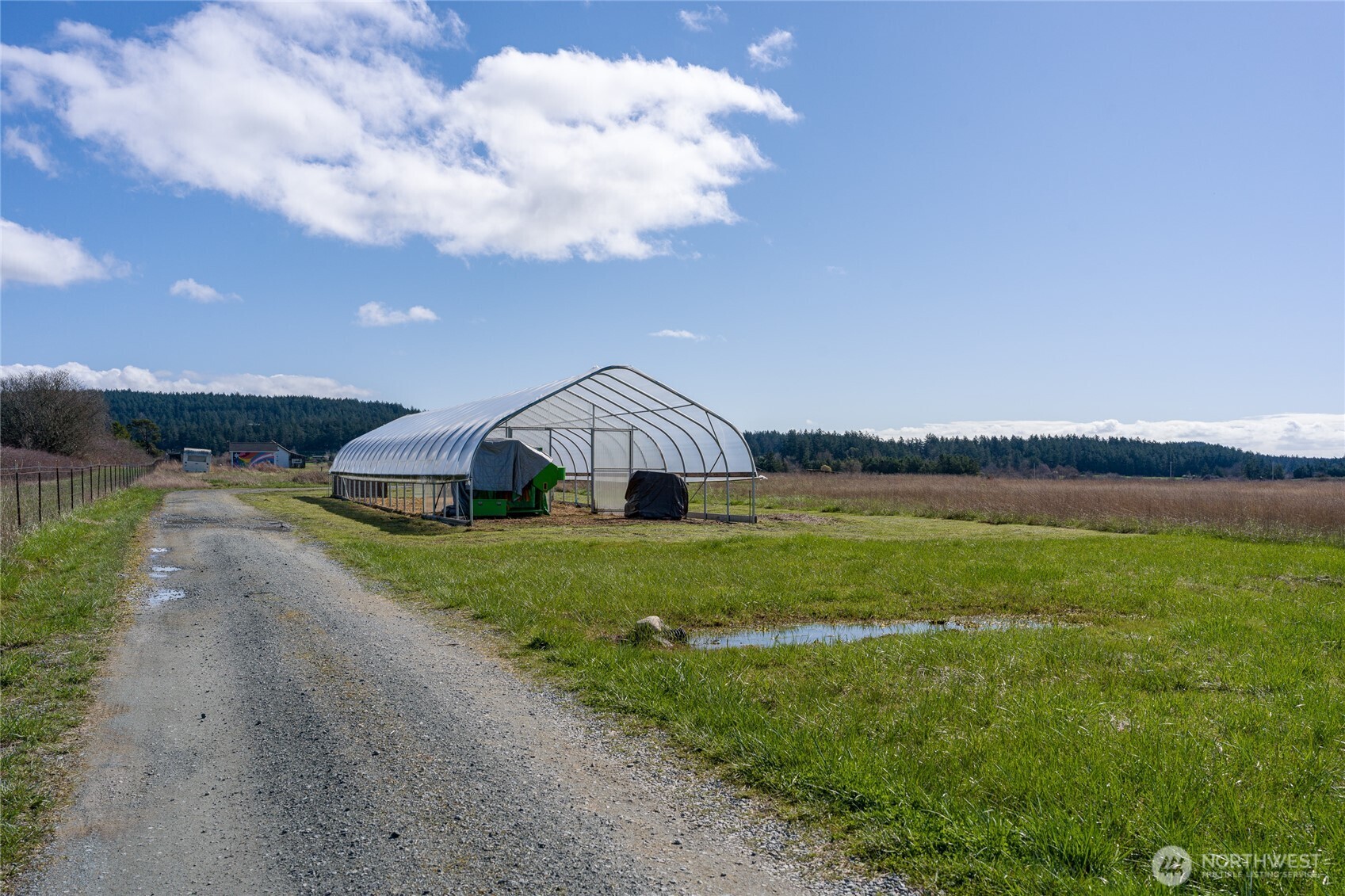 5625 Fisherman Bay Road Lopez Island, WA 98261 - Photo 29 of 40 a front view of a house with garden