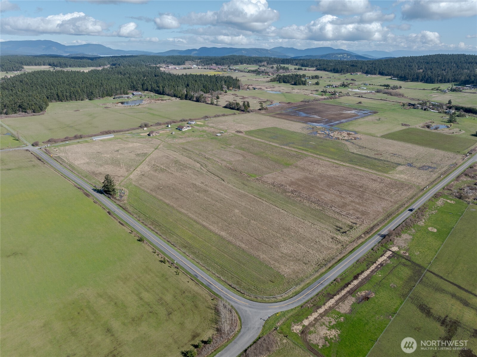 5625 Fisherman Bay Road Lopez Island, WA 98261 - Photo 3 of 40 a view from a balcony with an outdoor space