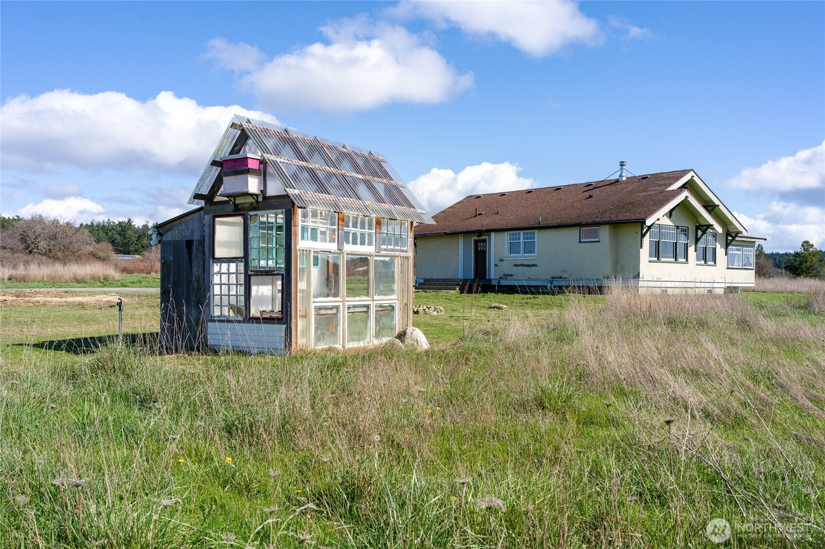 5625 Fisherman Bay Road Lopez Island, WA 98261 - Photo 34 of 40 a view of a house with yard and deck