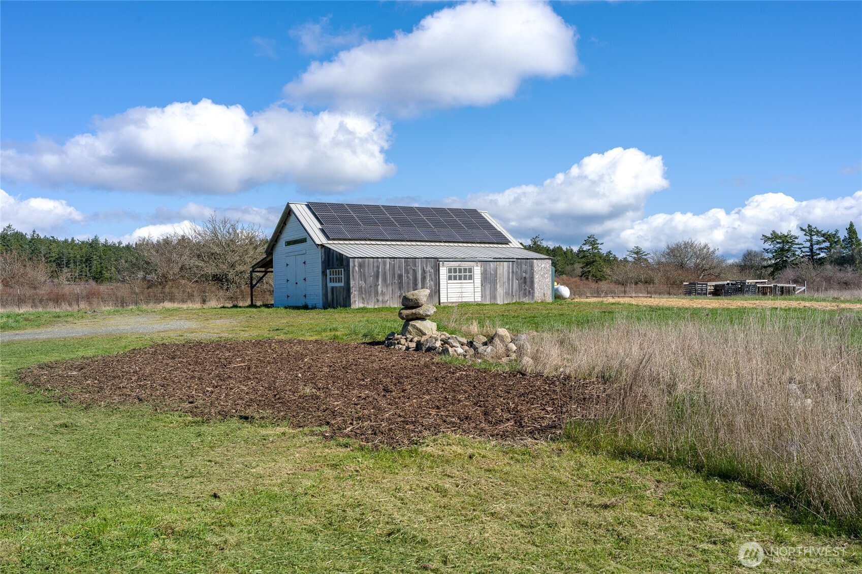 5625 Fisherman Bay Road Lopez Island, WA 98261 - Photo 38 of 40 a view of a house with a yard