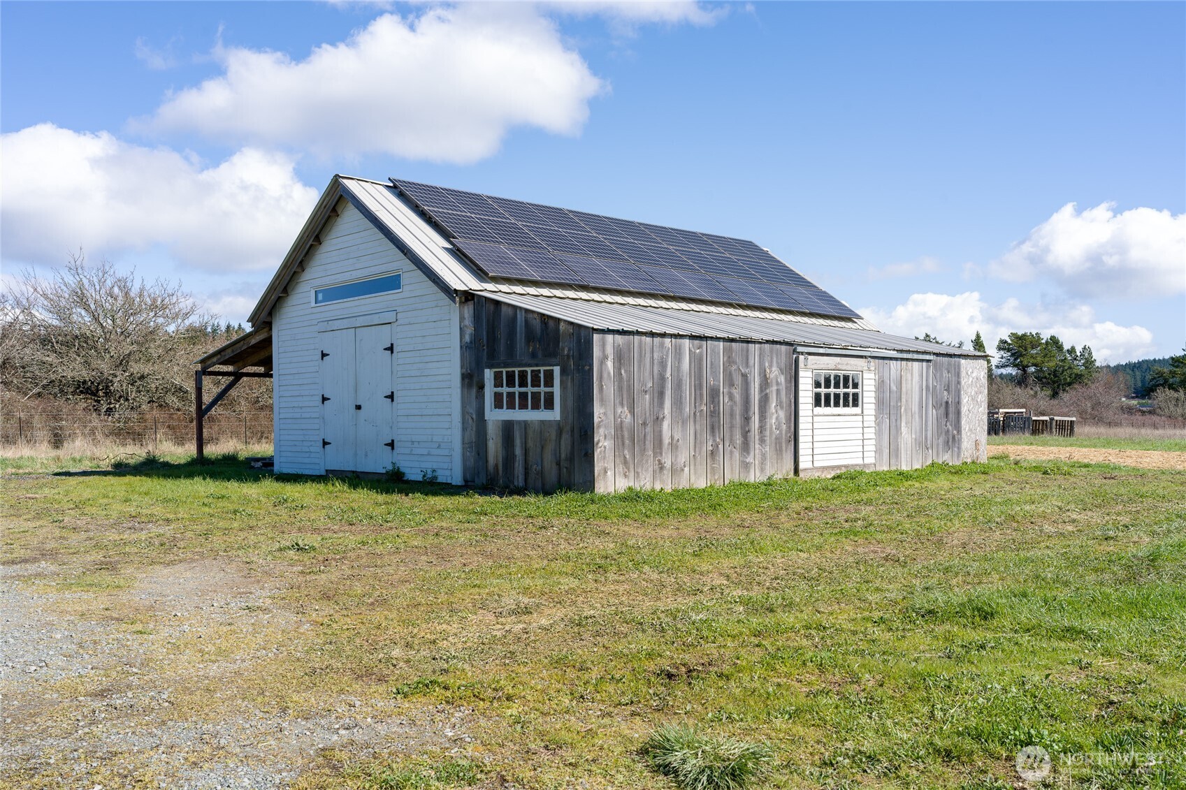 5625 Fisherman Bay Road Lopez Island, WA 98261 - Photo 39 of 40 a view of a house with a yard