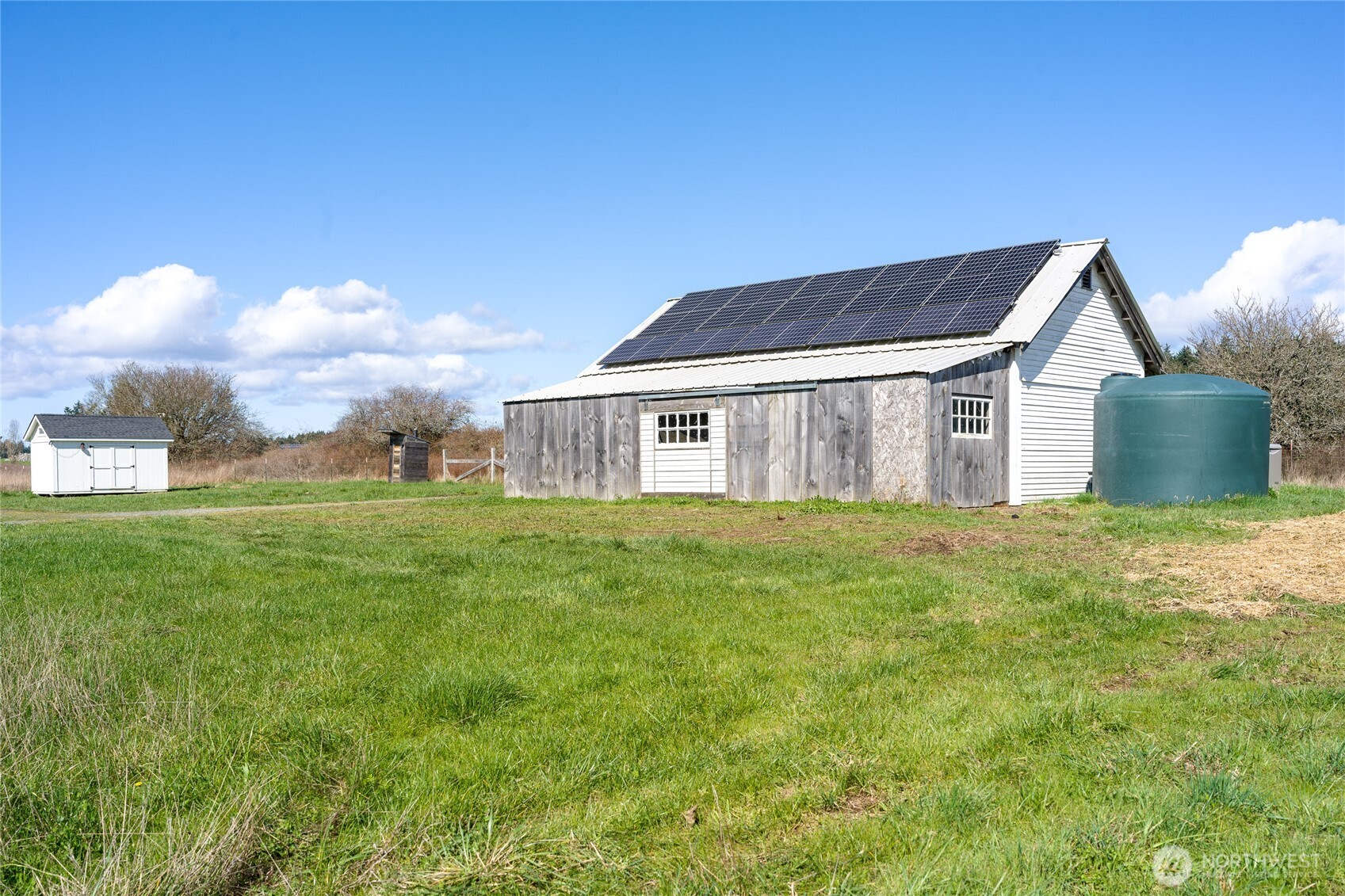 5625 Fisherman Bay Road Lopez Island, WA 98261 - Photo 40 of 40 a view of a house with a backyard