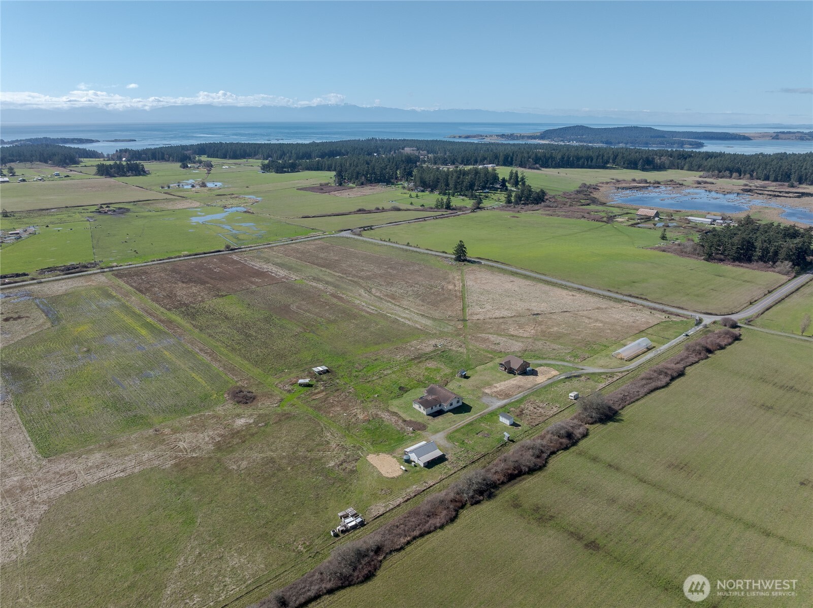5625 Fisherman Bay Road Lopez Island, WA 98261 - Photo 6 of 40 a view of a tennis court