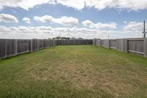 a view of a yard with an outdoor space