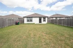 a view of a yard in front of house