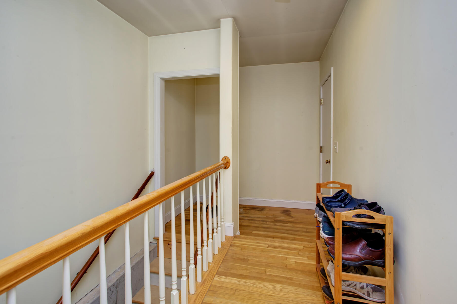 31 Kencomsett Circle Yarmouth Port, MA 02675 - Photo 15 of 19 a view of a hallway with wooden floor and staircase