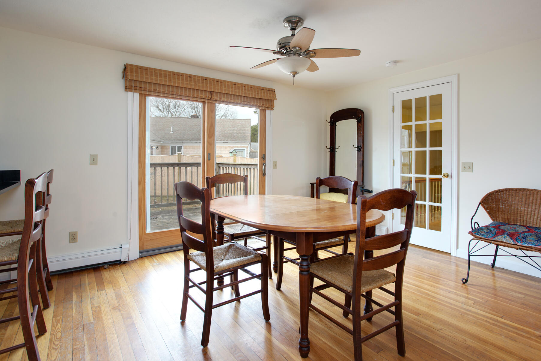 31 Kencomsett Circle Yarmouth Port, MA 02675 - Photo 4 of 19 a view of a dining room with furniture window and wooden floor