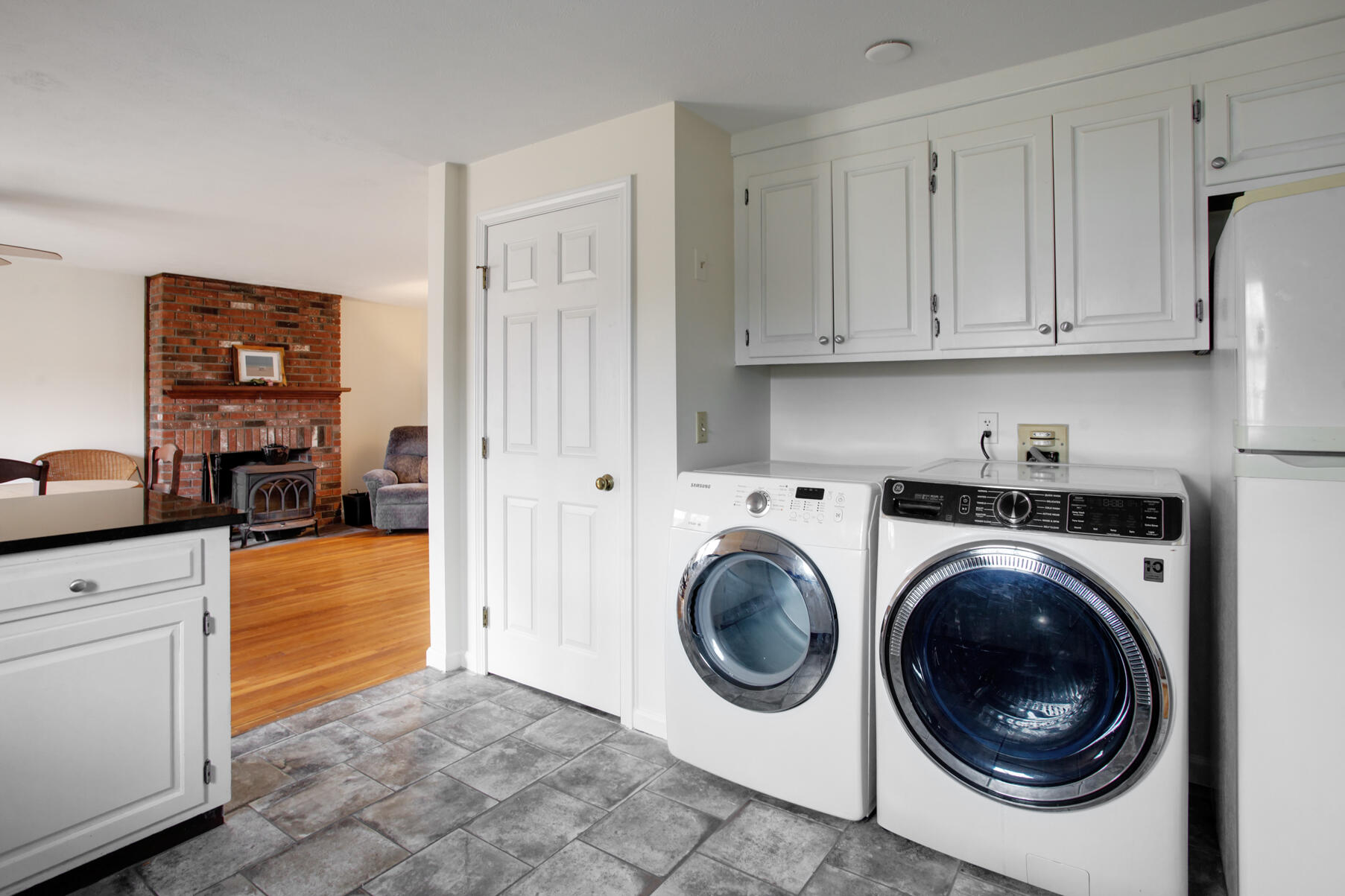 31 Kencomsett Circle Yarmouth Port, MA 02675 - Photo 7 of 19 a view of hallway with washer and dryer