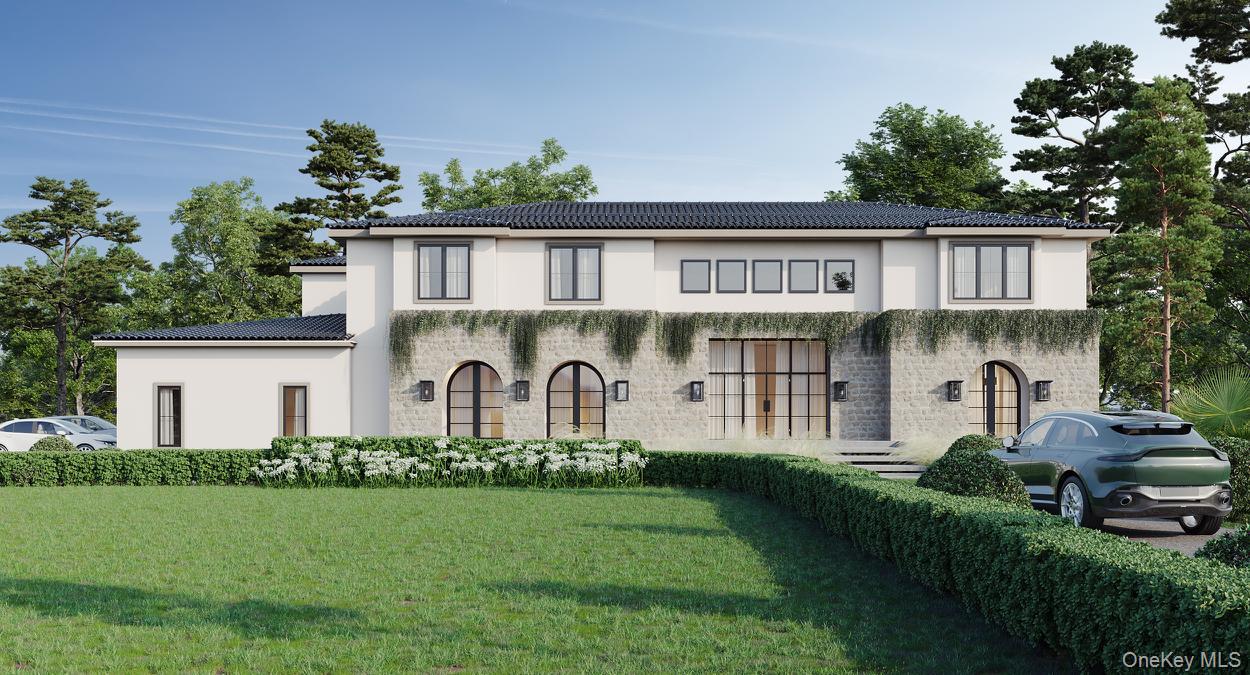 37 Viola Road Montebello, NY 10901 - Photo 2 of 6 a front view of a house with garden