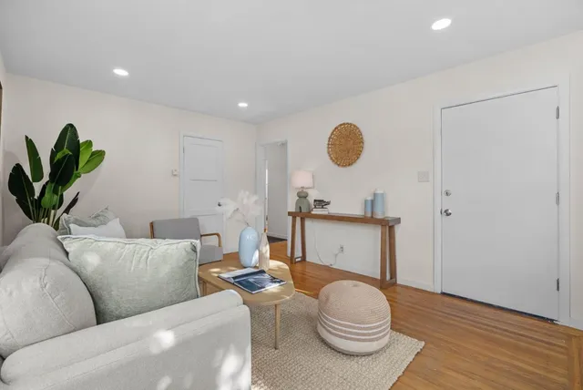 a kitchen with a stove and a refrigerator