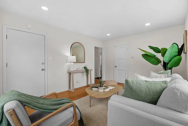 a view of a living room and dining room