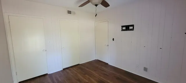 a view of small space with wooden floor