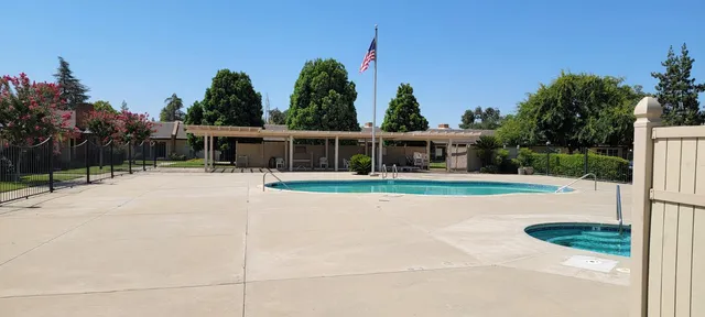 a view of house with yard outdoor seating and entertaining space