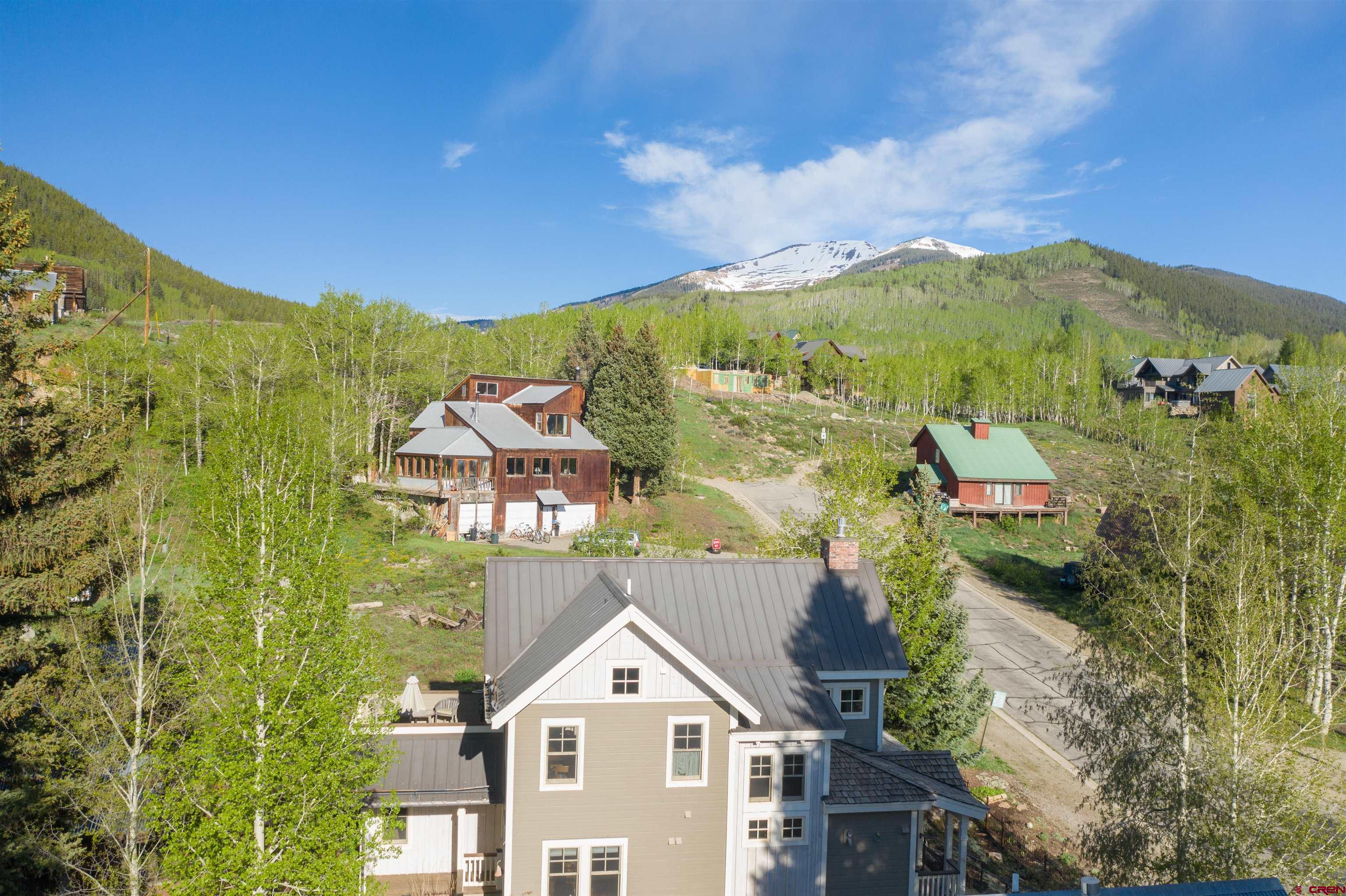 18 Maroon Avenue Crested Butte, CO 81224 - Photo 45 of 45 a view of a city with a building in the background
