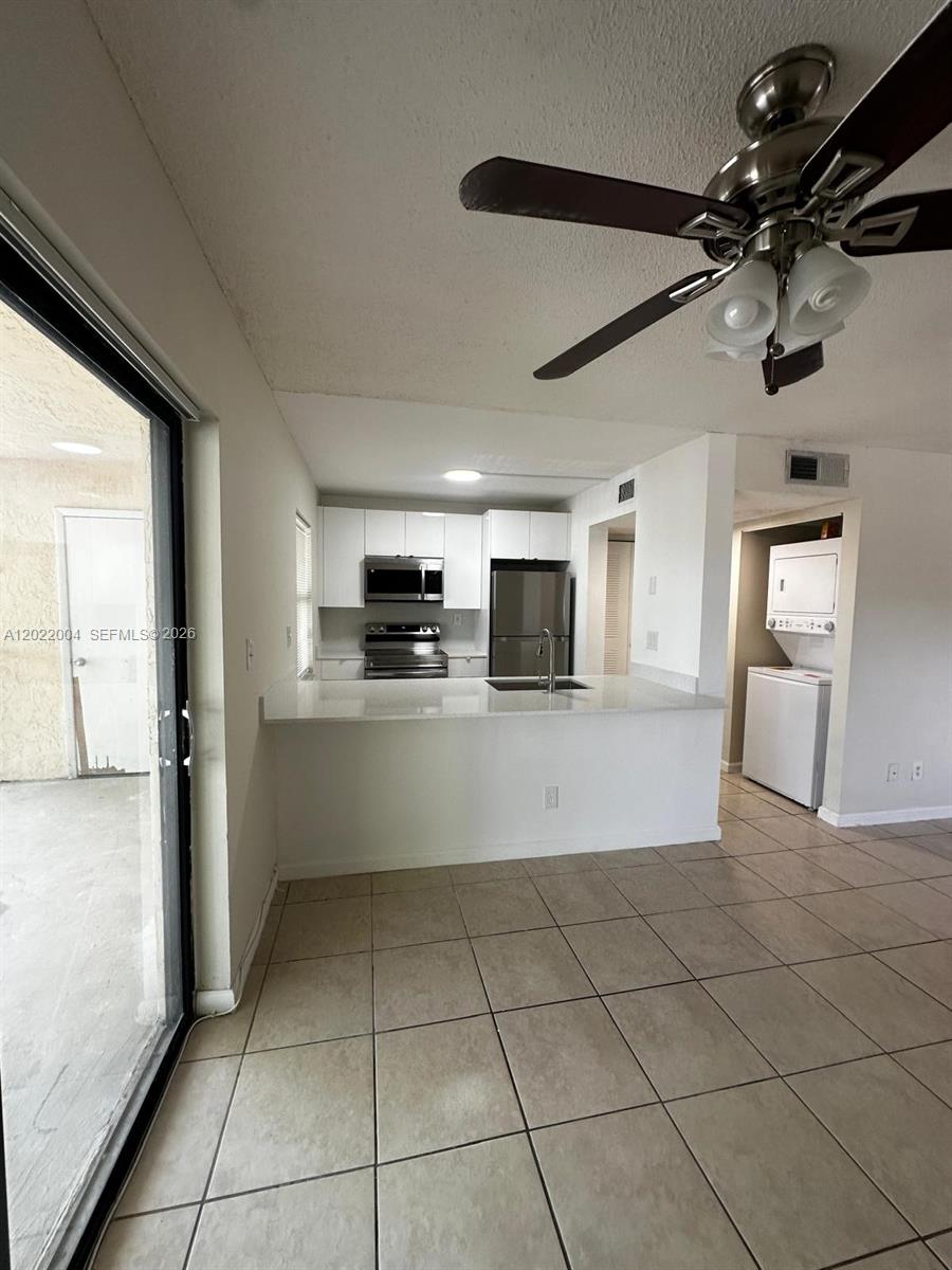 3400 Foxcroft Road, Unit 301 Miramar, FL 33025 - Photo 16 of 72 a view of a electric appliances in a kitchen