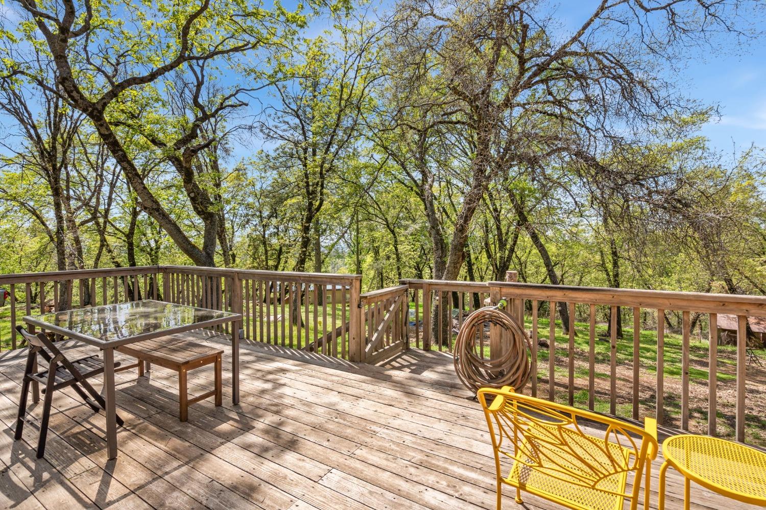 5271 Caprine Road Greenwood, CA 95635 - Photo 20 of 39 a view of balcony with wooden floor and fence