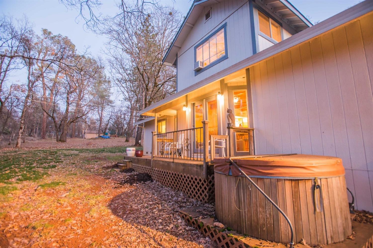 5271 Caprine Road Greenwood, CA 95635 - Photo 31 of 39 a view of outdoor space with deck and yard