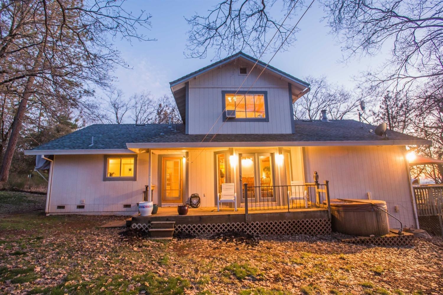 5271 Caprine Road Greenwood, CA 95635 - Photo 32 of 39 a front view of a house with a yard