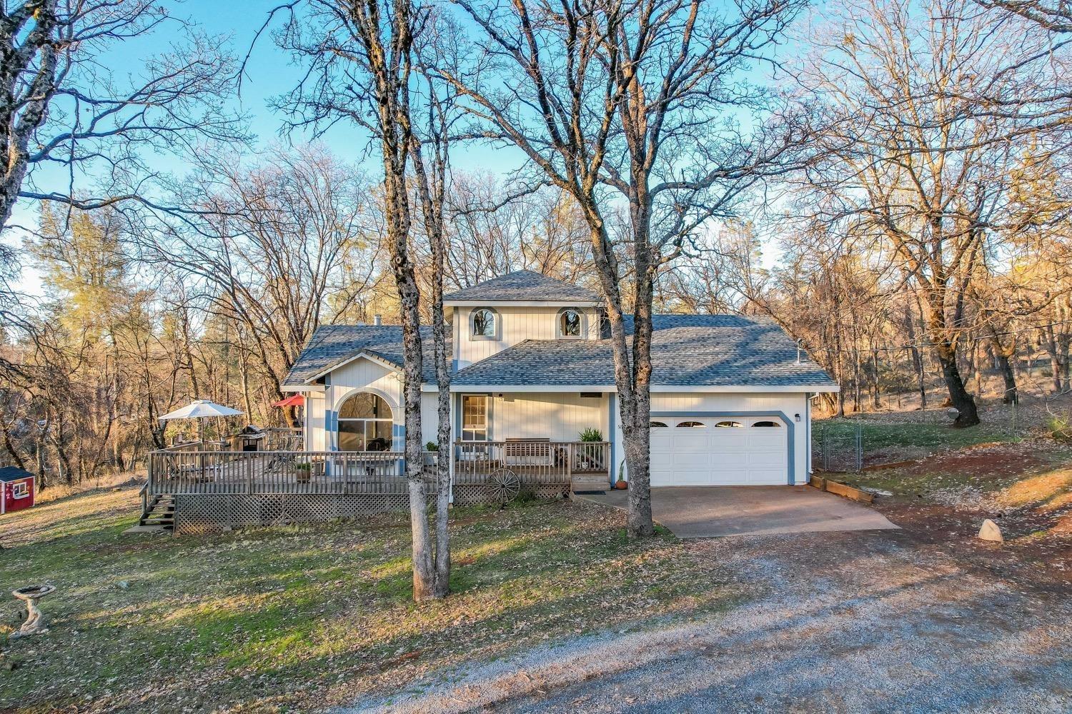 5271 Caprine Road Greenwood, CA 95635 - Photo 39 of 39 a front view of a house with garden