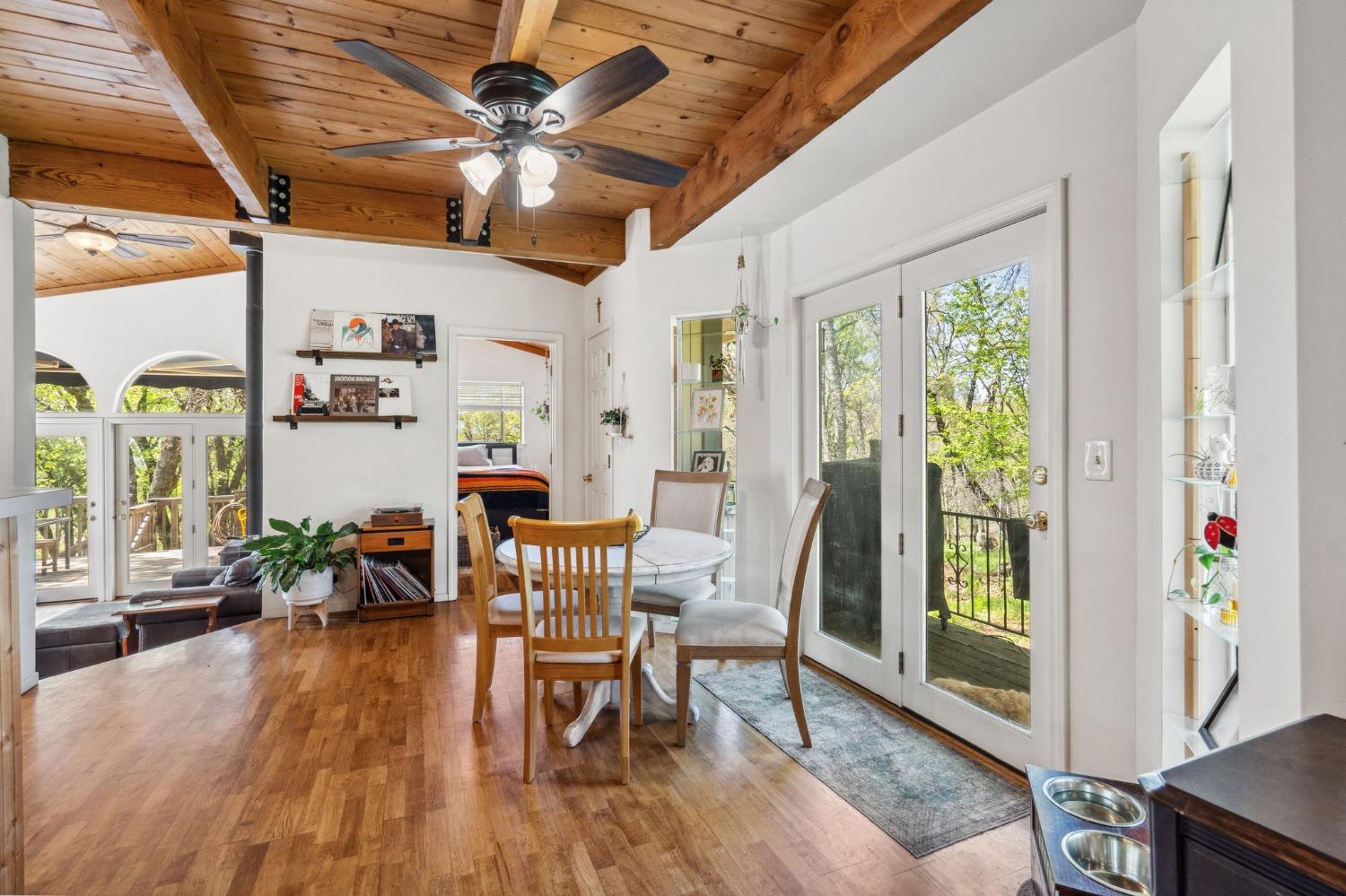 5271 Caprine Road Greenwood, CA 95635 - Photo 6 of 39 a view of a dining room with furniture window and wooden floor