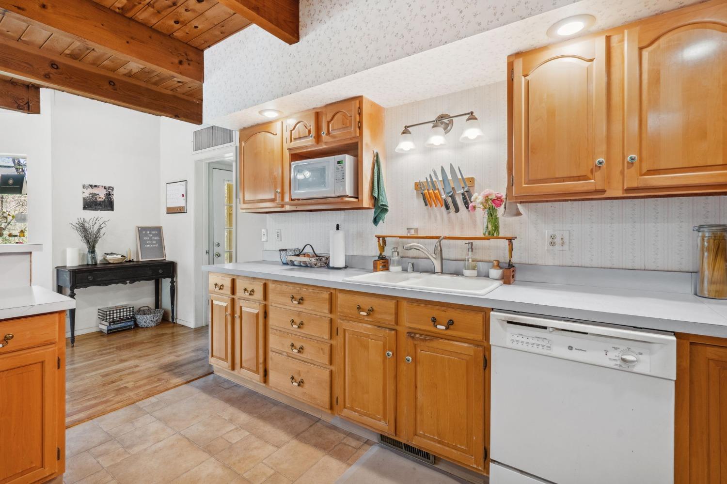 5271 Caprine Road Greenwood, CA 95635 - Photo 9 of 39 a spacious bathroom with double vanity a mirror and a sink