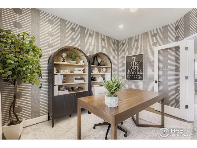 a view of a livingroom with furniture and window