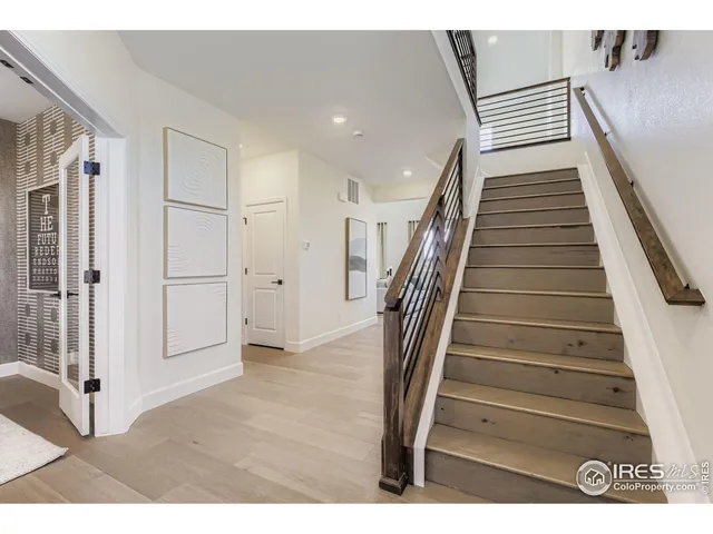 a view of entryway with wooden floor
