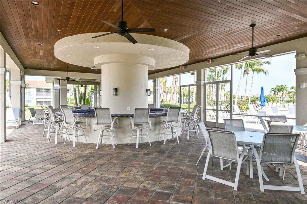 3359 Sandpiper Way Naples, FL 34109 - Photo 38 of 41 a view of a dining room with furniture window and outside view